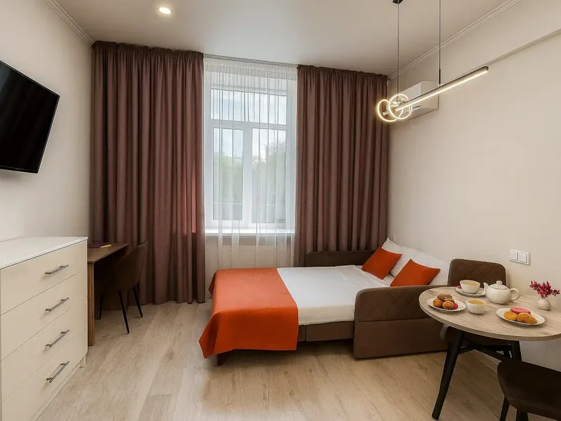 Номер Комфорт с полутороспальным диваном в апарт-отеле «Metro rooms»