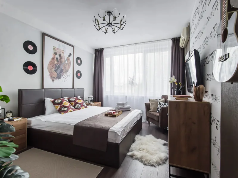 Номер в апартаментах «GM Apartments в стиле Рок-н-ролл с видом на Кремль»