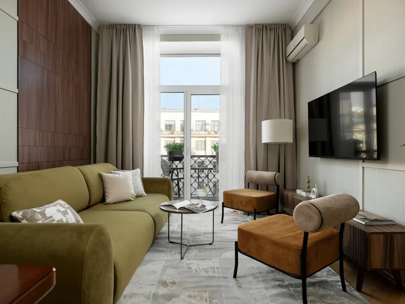Номер в апартаментах «GM Apartments Видовая Трехкомнатная с Эркерным Балконом»
