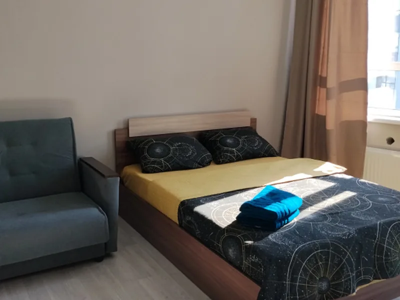 Номер в квартире «Уютная Студия в Тихом Районе»