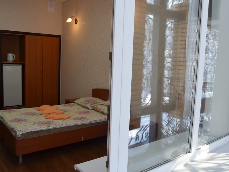 Кровать в общем номере в отеле «SSK VOO Mini-Hotel»